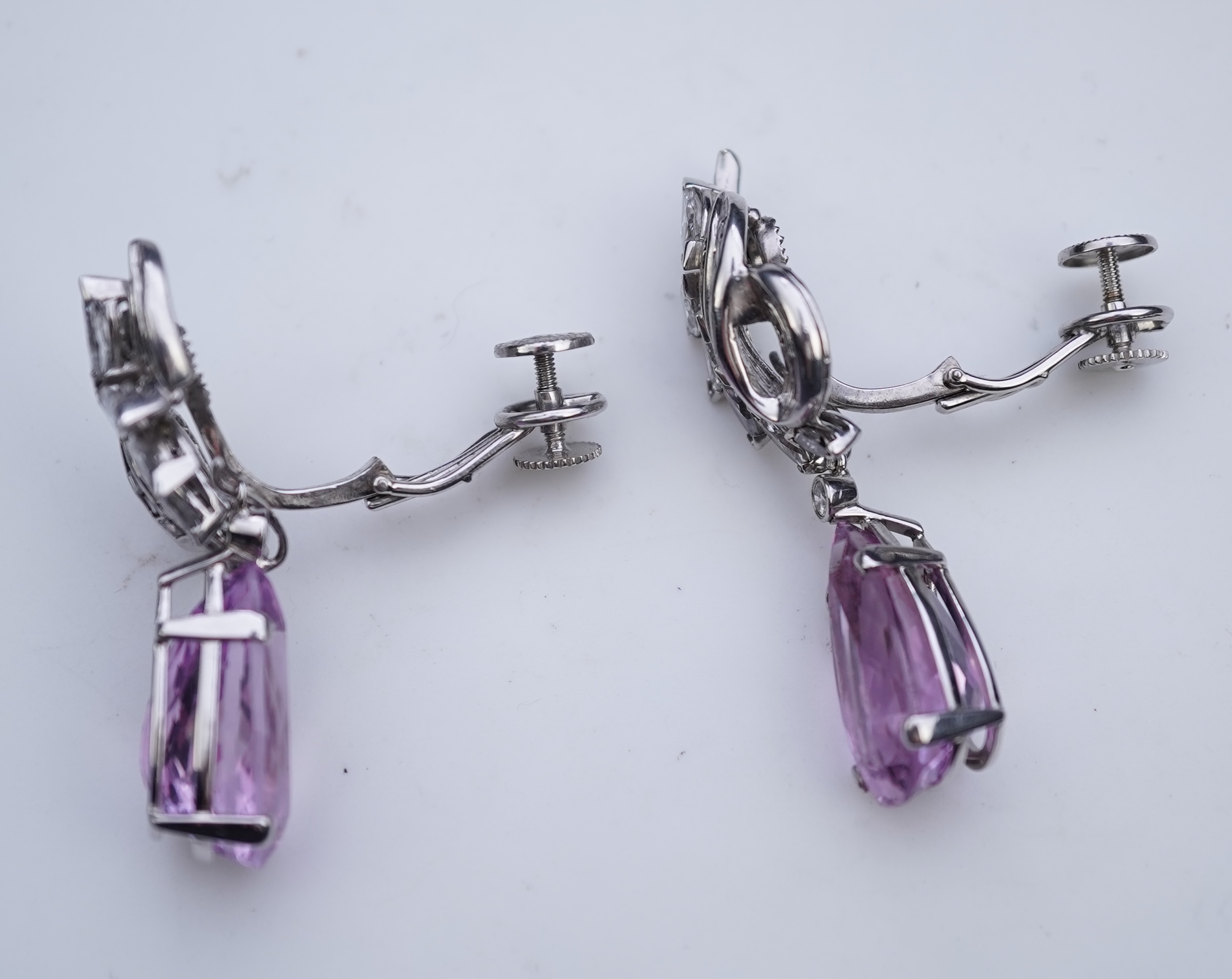 An attractive pair of 'day and night' kunzite and diamond ear clips